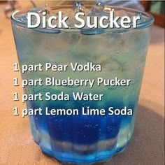 there is a blue drink in a glass with ice on the rim and instructions for how to make it