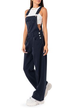 Whether you're an experienced boarder or just love the skater aesthetic, these denim overalls with kicky wide legs are brimming with laid-back style. Square neck Adjustable buckle straps 100% cotton Machine wash, dry flat Imported Overalls Outfit Inspiration, Cheap Relaxed Fit Denim Jumpsuit, Overalls Reference, Girl Overalls Outfit, Baggy Overalls Outfit, 90s Overalls Outfit, Dark Blue Overalls, Navy Blue Overalls, Overalls Aesthetic