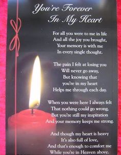 a candle with the words you're forever in my heart on it