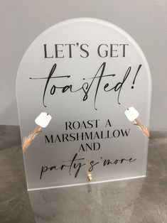 a sign that says, let's get toasted roasta marshmallow and party is more