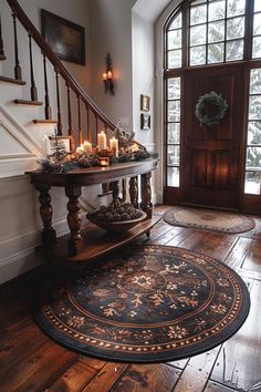 the entryway is decorated with candles and wreaths