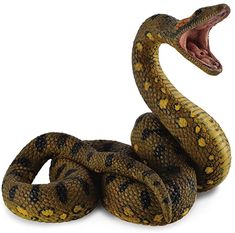 a large snake with its mouth open and it's head in the shape of a snake