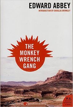 the monkey wrench gang by edward abbey book cover with red and black text