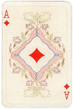 the back side of a playing card with red and blue designs on it's sides