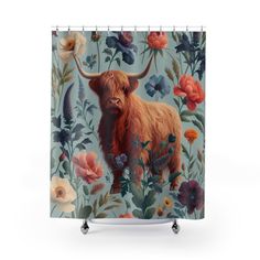 a shower curtain with an image of a bull in the middle of flowers on it