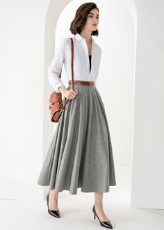 Winter Pleated Maxi Skirt, Gray Pleated Skirt For Fall, Gray Relaxed Fit Lined Maxi Skirt, White Midi Skirt For Winter, Gray Flowy Maxi Skirt, Gray Relaxed Fit Maxi Skirt With Lining, Gray Relaxed Maxi Skirt With Lined Skirt, Gray Relaxed Maxi Skirt With Lining, Pleated Maxi Skirt For Winter Workwear