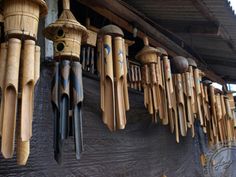 many wooden objects are hanging on the wall