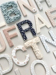 the letters are made up of different shapes and sizes