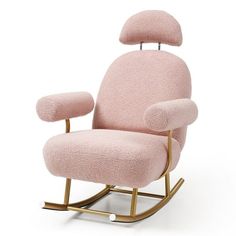 a pink rocking chair with gold frame and footrests on an isolated white background