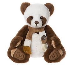 a brown and white teddy bear wearing a scarf