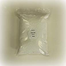 a bag of white powder sitting on top of a table