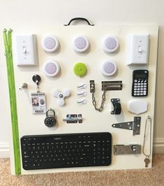 there are many different items on this white board, including keys and other things to use