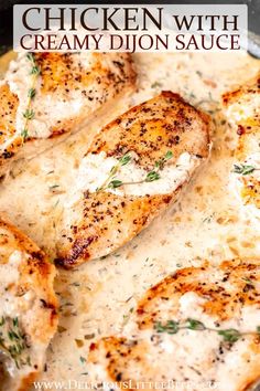 chicken with creamy dijon sauce in a skillet