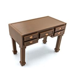 a small wooden desk with two drawers on one side and an open drawer on the other