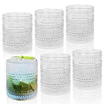 six glass tumblers with green leaves in them on a white background, set of 6