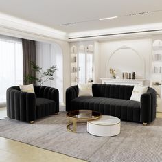 a living room filled with black and white furniture