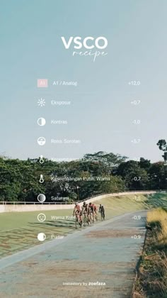 an image of a group of people riding bikes down a road with trees in the background