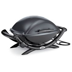 an image of a bbq grill with tongs on the handle barbeque