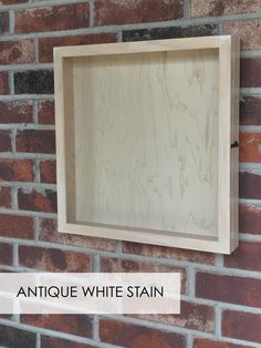 an antique white stain on a brick wall with the words antique white stain above it