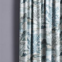 a curtain with blue and white designs on it