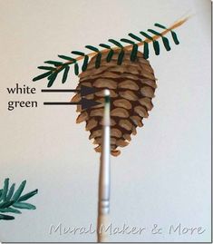 a close up of a pine cone on a stick with leaves and needles attached to it