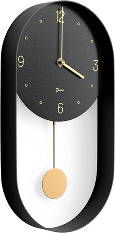 FORM AND FUNCTION – Stay on schedule with your Scandinavian inspired pendulum wall clock from Driini. Your unique swinging clock makes itself at home with urban design and unobtrusively silent analog operation. Included with your hanging wall clock are two pendulums: Choose the black one for a sleek and modern look, or go with gold for class and style. SMALL SIZE; BIG STYLE: Add a touch of modern elegance to any room with our swinging pendulum clock. Measuring 8 inches in diameter and 15.5 inches in length, it's the perfect size for those who prefer a more compact clock. Don't let its small size fool you though – this clock is a cool statement piece that is sure to catch the eye of anyone who enters your office, bedroom or living room. Place it on any wall and make a bold statement with th Clock Wall Decor Ideas, Sunburst Wall Art, Best Wall Clocks, Living Room Wall Color, Room Wall Colors, Pendulum Wall Clock, Pendulum Clock, Analog Clock, Metal Clock