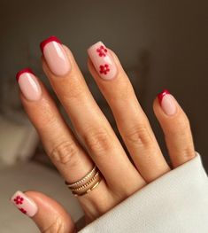 red french tip nails, nude base with red mini flowers, square nails, ring finger details, april nails, may nails, spring nails, summer nails 2024, minimalistic nail design inspo  credit insta: lillypalm_ Cute Red Nails, Red Summer Nails, Short Red Nails, Summer Nails 2024, Ring Finger Nails, Red Nail Art, May Nails, Classy Nail Designs, Square Nail Designs