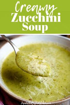 a spoon full of creamy zucchini soup