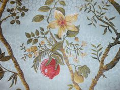 this is an image of a wallpaper with flowers and fruit on it's side