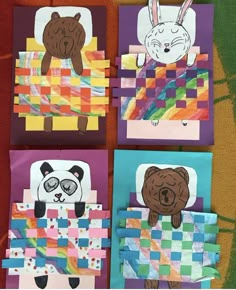 four colorful paper bags with animals and pandas on them, all made out of different colors