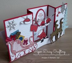 two christmas cards, one with santa's sleigh and the other with reindeers