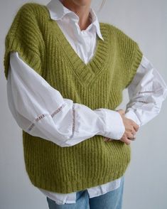 Hello, I'm the one, who won't let you down - green mohair vest. I will comfort you, keep you warm and will make you smile. I'm 100% hand made and proud of that. I consist of 70% knitt mohair and 30% of nylon, which makes me increadibly natural. I'm quite unique as could be worn all year long.I'm going well with dress, jeans, skirts ... or pretty much with everything you want. I'M AVAILABLE IN  DIFFERENT COLOURS!!!🌈I'm in one size and one size fits all because my measurements are :❤️   Width -54 Green V-neck Vest For Winter, Green Knit Vest For Fall, Sleeveless Green Sweater For Fall, Green Knitted Winter Vest, Green Winter Vest Top, Green Knitted Sleeveless Sweater Vest, Green Sleeveless Knitted Sweater, Green Knit Sleeveless Vest, Hand Knitted Sleeveless Winter Vest