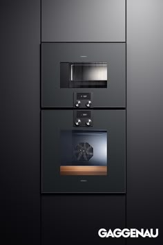 two black ovens side by side with the words gaggenau above them