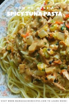 a white plate topped with pasta covered in sauce