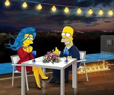 two people sitting at a table in front of a fire pit with the simpsons on it