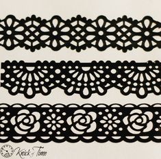 three pieces of black lace on white paper