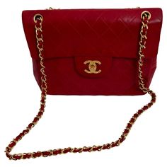 This is a large quilted lambskin bag which can be worn crossbody or shoulder. Vintage from the 80s it has a rare diamond etched CC turn lock fastening; interwoven leather and gold tone metal strap; a rear patch pocket; burgundy leather lining with two slot pockets, and one zipped pocket with a CC pull. This bag was made in France and is in good vintage condition. There are some minor scuffs and discoloration as shown in the pictures. It has many years of wear in it and is a classic Chanel model. Rare Diamond, Chanel Crossbody, Classic Chanel, Hologram Stickers, Chanel Model, Metal Straps, Gold Tone Metal, Fashion Handbags, Karl Lagerfeld