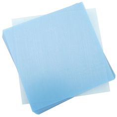 three pieces of blue colored paper on white background