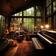 a living room filled with lots of furniture and musical instruments in front of large windows