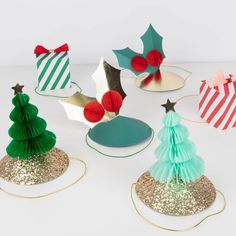 paper christmas tree decorations on white background