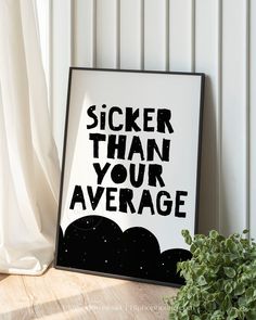 a black and white poster with the words sticker than your average on it next to a potted plant