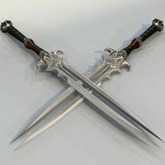 two swords with black handles are on display