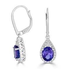 These 18k white gold earrings can do the trick nicely to offer an eye-catchy appeal. An earring that creates a dynamic shimmer and captivating shine, this jewelry has oval cut Tanzanite and round Diamond embellishment. Product Information SKU ADG70299/11995 Metal Type 18K Metal Color White gold Ring Style Halo Dangle Primary Stone Gemstone Name Tanzanite Gemstone Species Zoisite No. Of Gemstones 2 Gemstone Shape Oval Gemstone Weight 3.93 cts Gemstone Size 9x7 Origin Tanzania Secondary Stone Gems Tanzanite Earrings, Cut Earrings, Tanzanite Gemstone, White Gold Earrings, Blue Gemstones, Metal Color, Diamond Gemstone, Gold Style, White Gold Rings