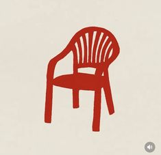 a red chair sitting on top of a white wall