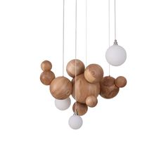 three wooden balls hanging from the ceiling