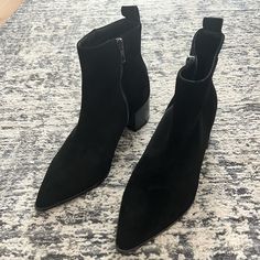 Black Suede Booties From Saks Fifth Avenue. Brand New, Never Worn. Black Suede Ankle Heeled Boots, Black Suede Boots For Fall, Black Suede Heeled Boots For Fall, Black Suede Heels For Fall, Black Low Heel Boots With Stacked Heel, Black Boots With Stacked Low Heel, Black Low Heel Medium Width Heeled Boots, Chic Black Suede Boots, Edgy Suede Heels With Pointed Toe