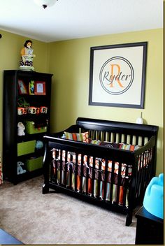 a baby's room with a crib and bookcase