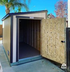 a storage shed with the door open