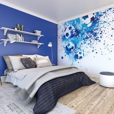 a bedroom with blue walls and wooden flooring is pictured in this image, there are shelves on either side of the bed