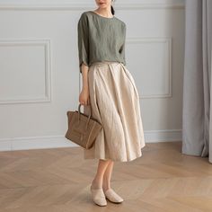 "Cool and comfortable for hot summer days, this natural linen skirt is elegant and stylish.    It is a wonderful wardrobe staple that's a timeless classic you'll wear again and again.Pure natural linen materials, comfortable, breathable, refreshing and soft fabric. ★★FEATURES Linen 55% + Cotton 45% ( Medium Weight，Comfortable, Breathable and Washed Soft fabric) Two side pockets Back elastic waist High waist skirt Midi skirt Casual skirt Long linen skirt A-Line skirt Simple skirt Perfect for Summ Linen Skirt Outfit, Linen Skirt Suit, Custom Skirt, Long Linen Skirt, Linen Midi Skirt, Midi Skirt Casual, Skirt Linen, Skirt A Line, Plus Size Skirt